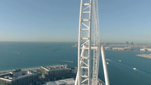 DUBAI, UNITED ARAB EMIRATES - DECEMBER 26, 2019. Aerial view of Ain Dubai, the worlds tallest Ferris wheel, and Dubai cityscape — Stock Video