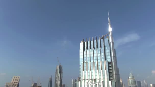 DUBAI, UNITED ARAB EMIRATES - DECEMBER 30, 2019. Aerial view of shining Burj Khalifa skyscraper spire, the tallest building in the world — Stock Video