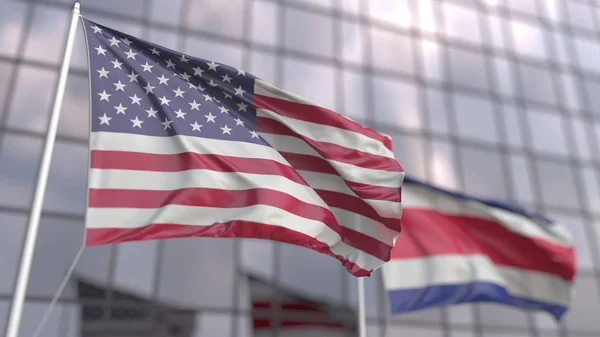 Waving flags of the United States and Costa Rica in front of a modern skyscraper. 3D rendering — Stock Photo, Image