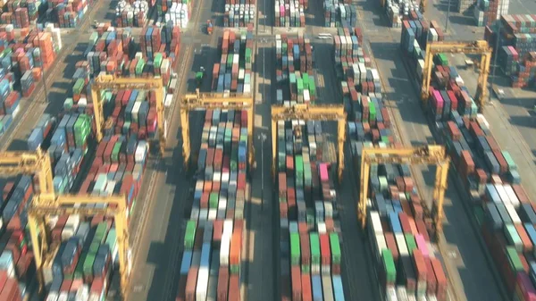 Aerial long exposure shot of a busy seaport container yard — 스톡 사진