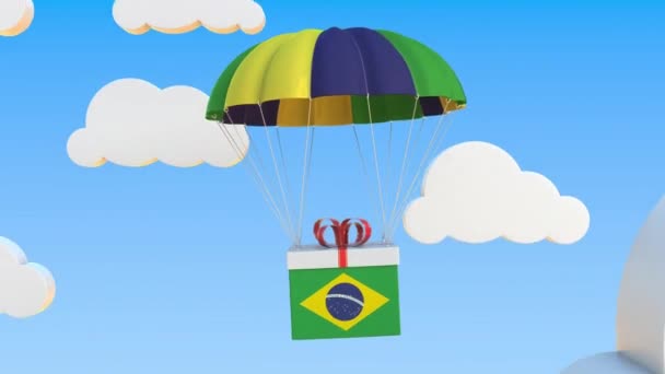 A brazil nemzeti zászlós doboz ejtőernyővel esik. Loopable konceptuális 3D animáció — Stock videók
