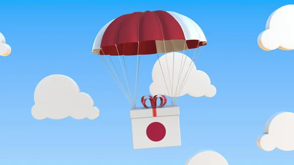 Carton com bandeira do Japão cai com um paraquedas. Renderização 3D — Fotografia de Stock