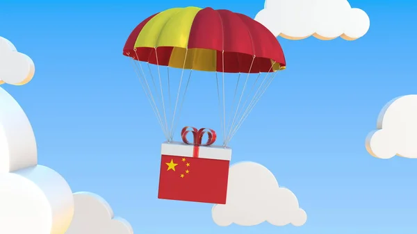 中国国旗の入った箱はパラシュートで落下する。3Dレンダリング — ストック写真