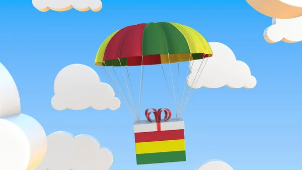 Krabice s národní vlajkou Bolívie padá s padákem. 3D vykreslování — Stock fotografie