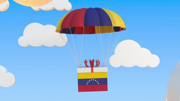 Box mit Nationalflagge von Venezuela fällt mit einem Fallschirm. Schlupflöcher konzeptionelle 3D-Animation — Stockvideo