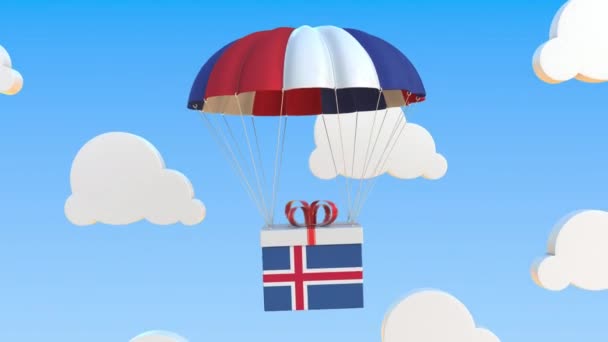 Karton mit isländischer Flagge stürzt mit Fallschirm ab. Schlupflöcher konzeptionelle 3D-Animation — Stockvideo