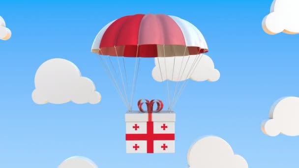 Коробка с национальным флагом Грузии падает с парашютом. Зацикленная концептуальная 3D анимация — стоковое видео
