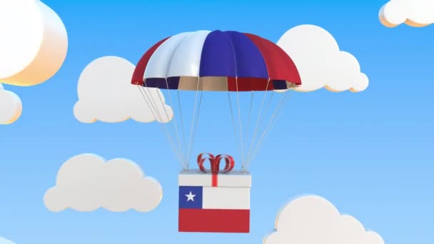 Caja con bandera nacional de Chile cae con un paracaídas. Animación 3D conceptual Loopable — Vídeos de Stock