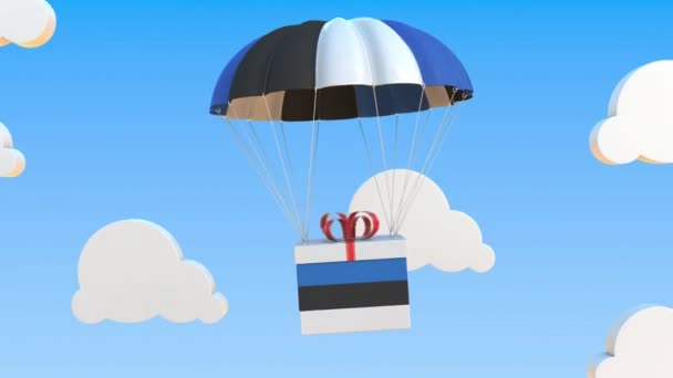 Коробка с национальным флагом Эстонии падает с парашютом. Зацикленная концептуальная 3D анимация — стоковое видео
