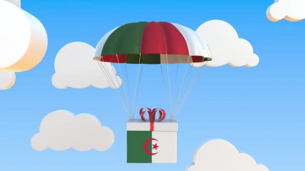 Boîte avec drapeau national de l'Algérie tombe avec un parachute. Animation 3D conceptuelle bouclable — Video