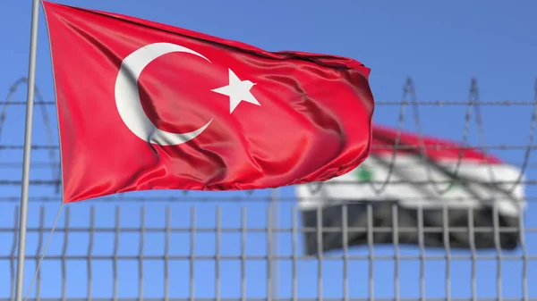 Waving flags of Turkey and Syria separated by barbed wire fence. Conflict related conceptual 3D rendering — 스톡 사진