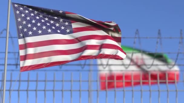 Waving flags of the USA and Iran separated by barbed wire fence. Conflict related loopable conceptual 3D animation — 비디오