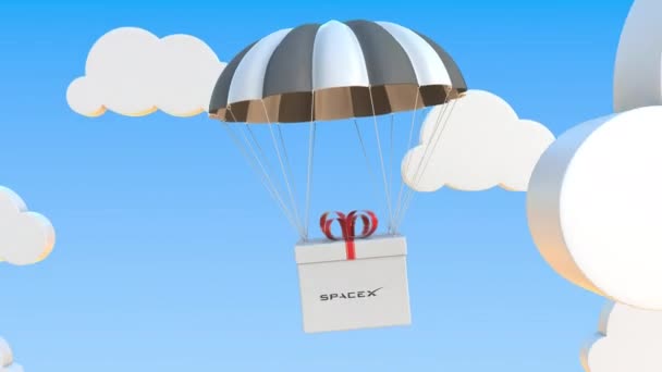 El logotipo de SPACEX en la caja móvil se mueve bajo el paracaídas. Animación en 3D loopable editorial — Vídeos de Stock