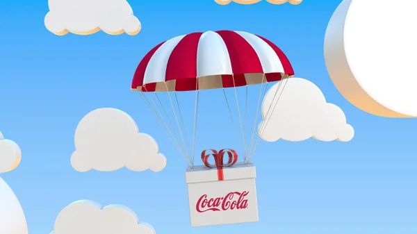 Kotak dengan logo Coca-Cola jatuh dengan parasut. Perenderan 3D Editorial — Stok Foto