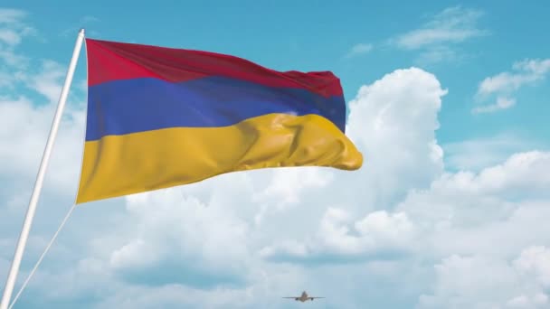 飛行機はアルメニアの国旗を掲げて空港に到着する。アルメニア観光 — ストック動画