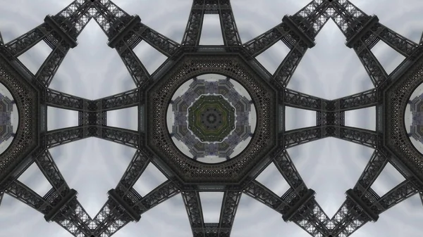 Slavný Eiffelova věž na pozadí oblohy, kaleidoskopický efekt — Stock fotografie