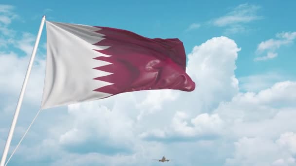 飛行機はカタールの旗を持って空港に到着します。カタリ観光 — ストック動画