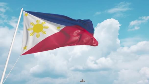 Vliegtuig arriveert op vliegveld met vlag van Filippijnen — Stockvideo