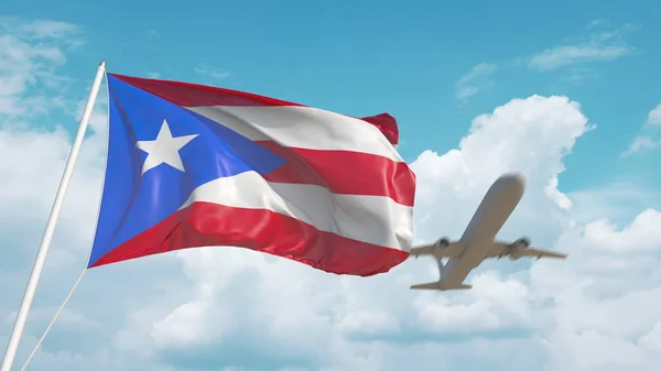 Samolot zbliża się do flagi Portorykańskiej. Turystyka w Portoryko. 3d renderowanie — Zdjęcie stockowe
