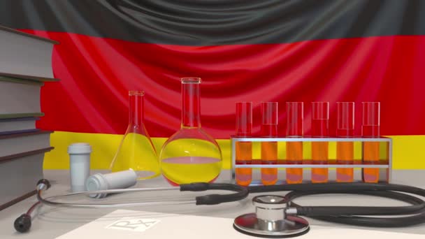 Alman bayrağı geçmişinde klinik laboratuvar ekipmanları. Almanya 'da sağlık ve tıbbi araştırma kavramsal animasyonla ilgilidir — Stok video