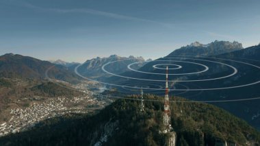 Aerial view of antennas transmitting radio signals in rural mountainous area clipart