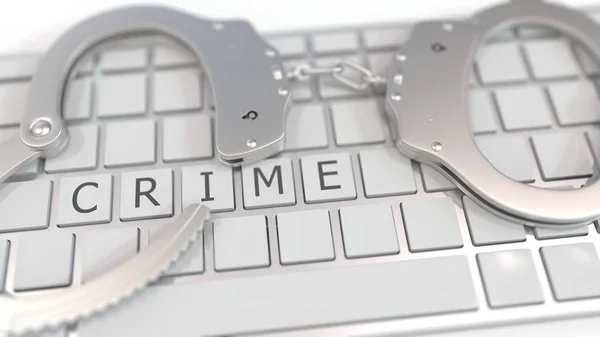 Handcuffs on keyboard with CRIME word. Computer crime related conceptual 3D rendering — 스톡 사진