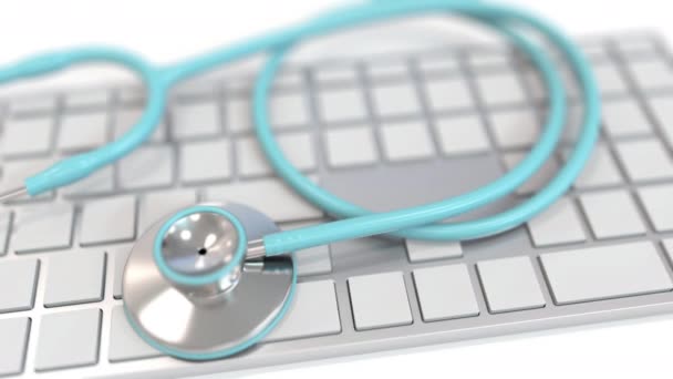 Stethoscope on keyboard with TELE text on keys. Modern telemedicine related conceptual 3D animation — 图库视频影像