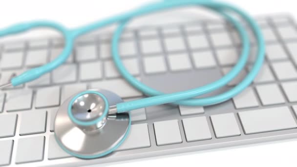 Stethoscope on keyboard with PHARMA text. Modern medicine related conceptual 3D animation — 图库视频影像