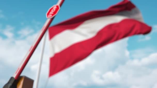 Closed boom gate on the Austrian flag background. Restricted entry or certain ban in Austria — ストック動画