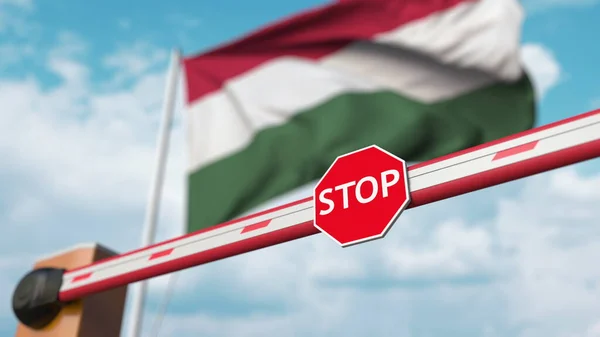 Closed boom gate on the Hungarian flag background. Restricted entry or certain ban in Hungary. 3D rendering — 스톡 사진