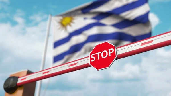 Geschlossene Leitplanke mit Stoppschild gegen die uruguayische Flagge. Einreisebeschränkungen oder ein bestimmtes Verbot in Uruguay. 3D-Darstellung — Stockfoto