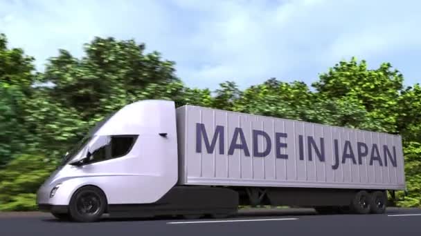 Camion remorque avec texte MADE IN JAPAN sur le côté. Animation 3D bouclable liée à l'importation ou l'exportation japonaise — Video