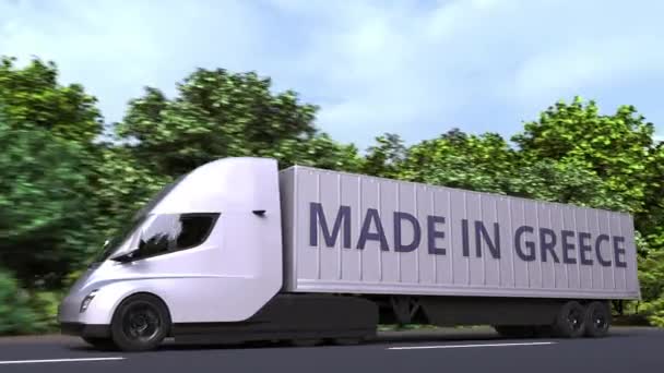 Moderne elektrische oplegger met Made In Greece tekst aan de zijkant. Griekse import of export gerelateerde loopable 3d animatie — Stockvideo