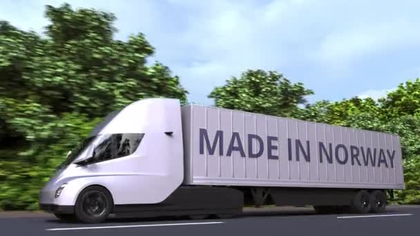 Trailer truck with MADE IN NORWAY text on the side. Norwegian import or export related loopable 3D animation — 图库视频影像