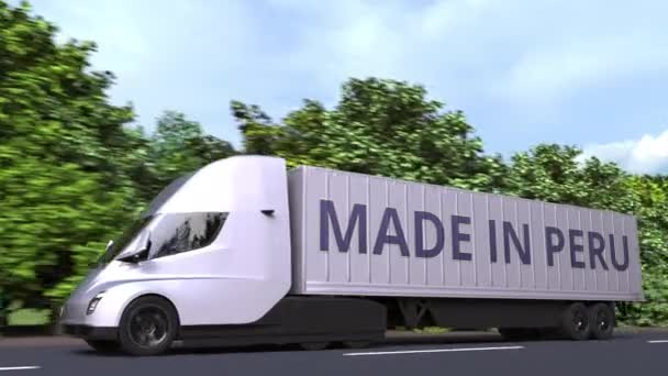 Camion semi-remorque électrique moderne avec texte MADE IN PERU sur le côté. Importation ou exportation péruvienne liée à l'animation 3D en boucle — Video