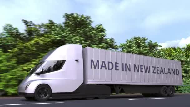 Trailer truck with MADE IN NEW ZEALAND text on the side. Import or export Loopable 3D animation — Stock Video