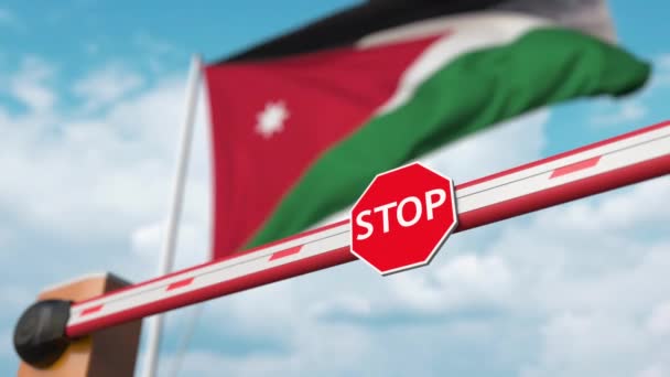 Barrier gate being opened with flag of Jordan as a background. Jordanian Free border crossing or lifting a ban — Stock Video