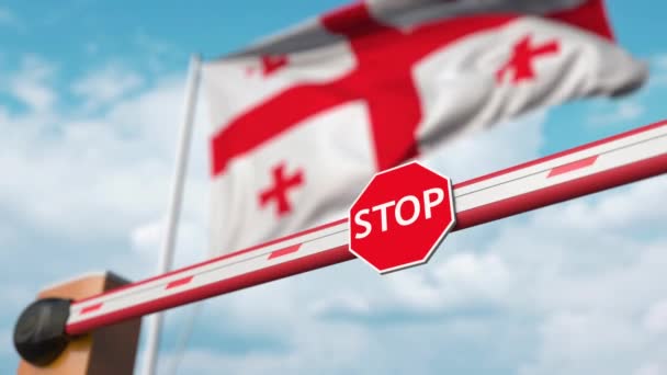 Åpner bommen med stoppskilt mot det georgiske flagget. Fri innreise eller oppheving av forbud i Georgia – stockvideo