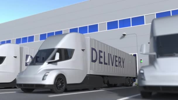 Camiones semirremolques modernos con texto de ENTREGA que se cargan o descargan en el almacén. Animación 3D Loopable — Vídeos de Stock