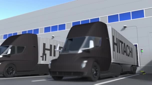 Hitachi logóval ellátott teherautók berakodása vagy kirakodása a raktárban. Logisztikával kapcsolatos loopable 3D animáció — Stock videók