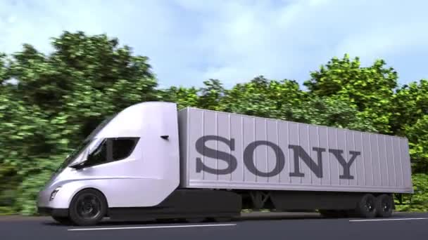 Electric semi-trailer truck with SONY logo on the side. Editorial loopable 3D animation — Stock Video