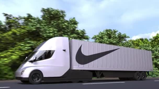 Ηλεκτρικό ημι-ρυμουλκούμενο φορτηγό με λογότυπο Nike στο πλάι. Εκδοτικό κενό 3d animation — Αρχείο Βίντεο