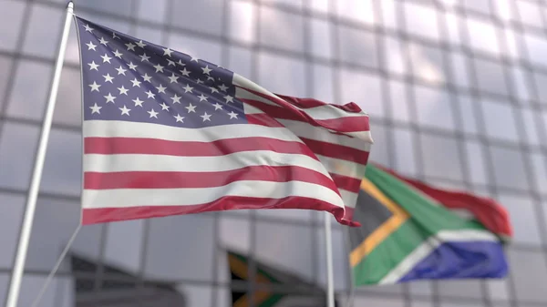 Flying flags of the United States and South Africa in front of a modern skyscraper. 3D rendering — Stock Photo, Image