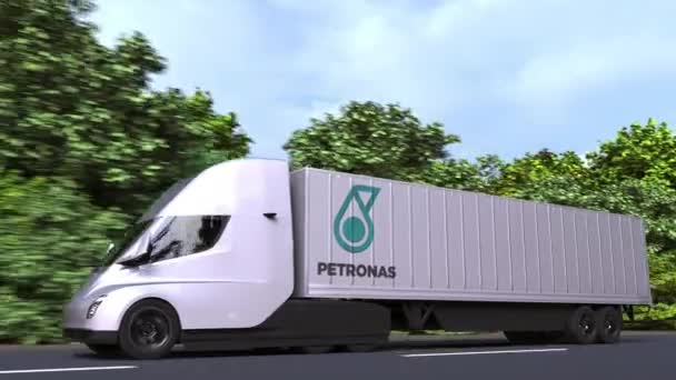 横にペトロナスのロゴが付いた電動セミトレーラートラック。編集ループ可能な3Dアニメーション — ストック動画