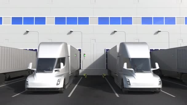 Camions semi-remorques électriques à la baie de chargement de l'entrepôt avec logo TOSHIBA sur le mur. Animation 3D éditoriale — Video