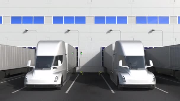 Electric semi-trailer trucks at warehouse loading bay with PANASONIC logo on the wall. Editorial 3D animation — Stock Video