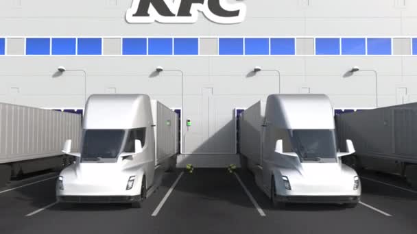 Semirimorchi elettrici nella zona di carico del magazzino con logo KFC sulla parete. Animazione editoriale 3D — Video Stock