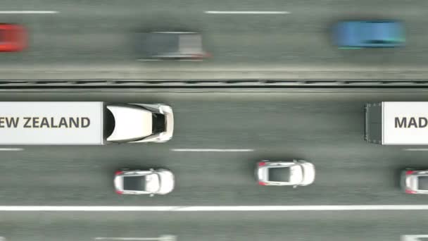 Ciężarówki przyczepy z Made In New Zealand tekst jazdy wzdłuż drogi. Pętla biznesowa animacja 3D — Wideo stockowe
