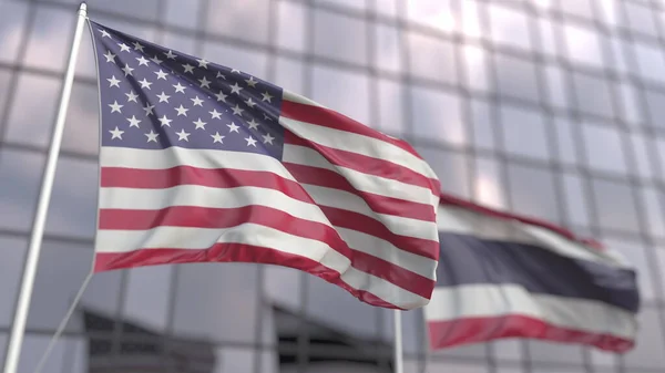 Zwaaiende vlaggen van de Verenigde Staten en Thailand voor een modern gebouw. 3d destructie — Stockfoto