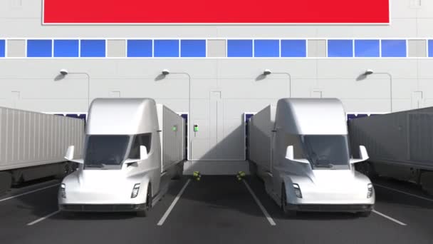 Electric trailer trucks at warehouse loading bay with flag of TAIWAN. Taiwanese logistics related conceptual 3D animation — Stock Video